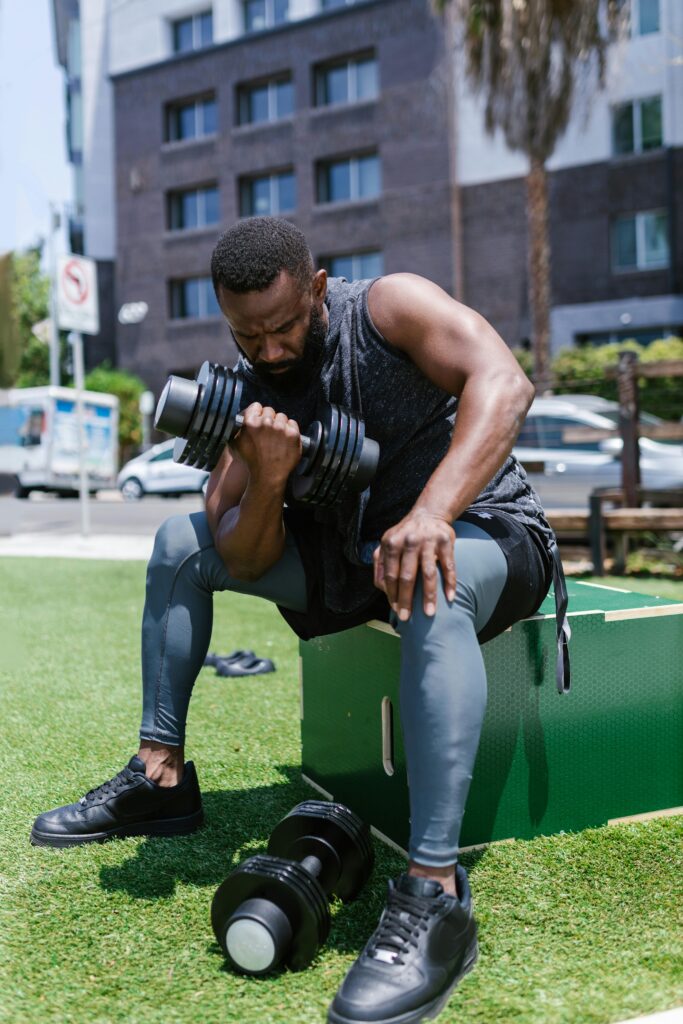 A person doing a high-intensity interval workout in a park for efficient fat burning.