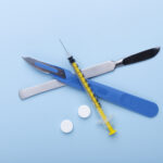 Modern Ozempic pen injector on a clean background, symbolizing innovative weight loss treatment.