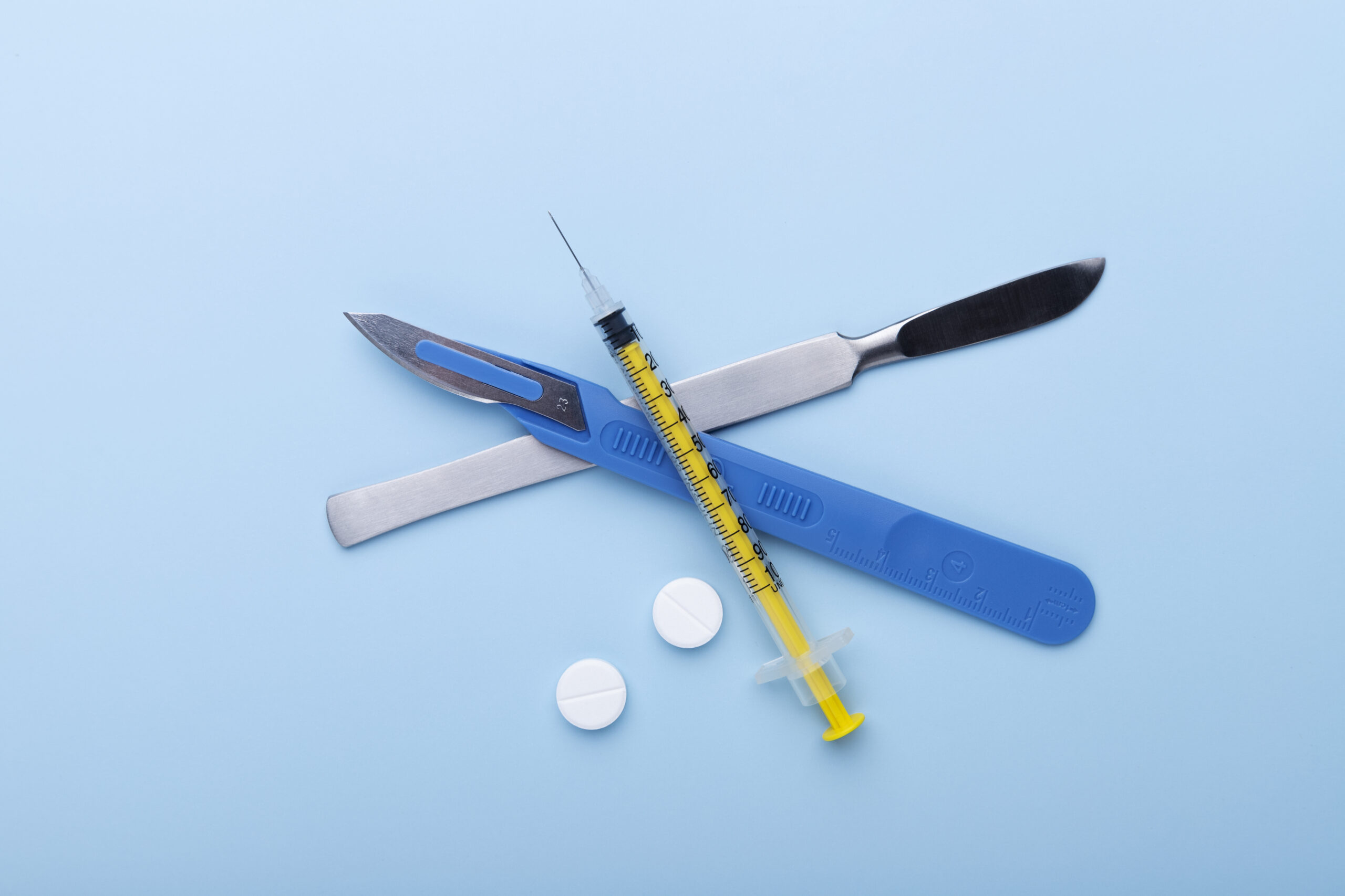 Modern Ozempic pen injector on a clean background, symbolizing innovative weight loss treatment.